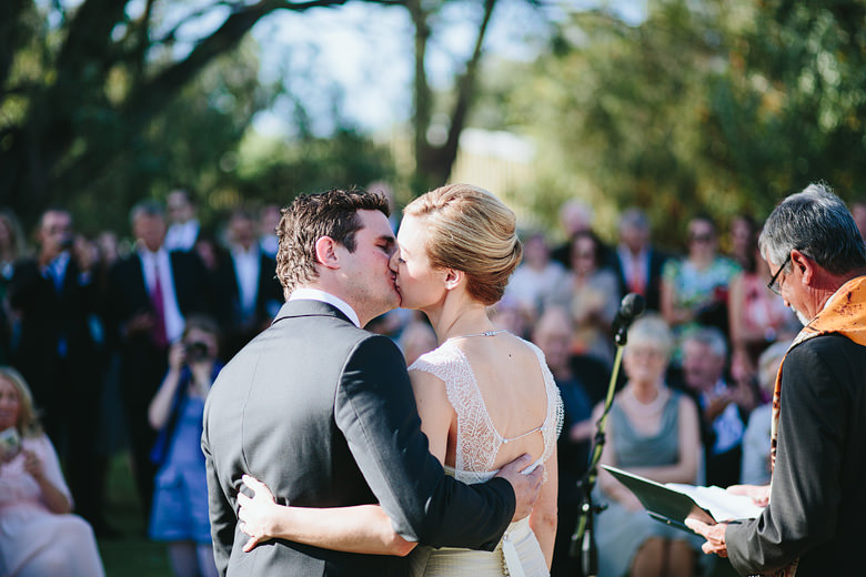 bride and groom first kiss alternative wedding photography