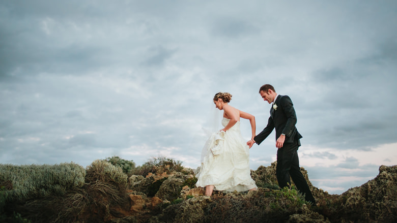 Beautiful bride and groom Cottesloe beach